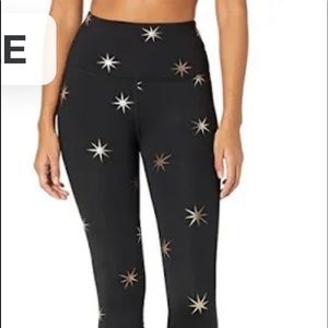 Black beyond yoga leggings with gold stars